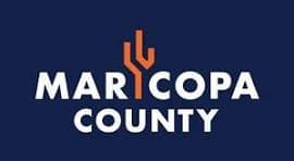 Maricopa County logo with white text on a dark blue background and an orange cactus graphic forming the letter "I" in "MARICOPA.